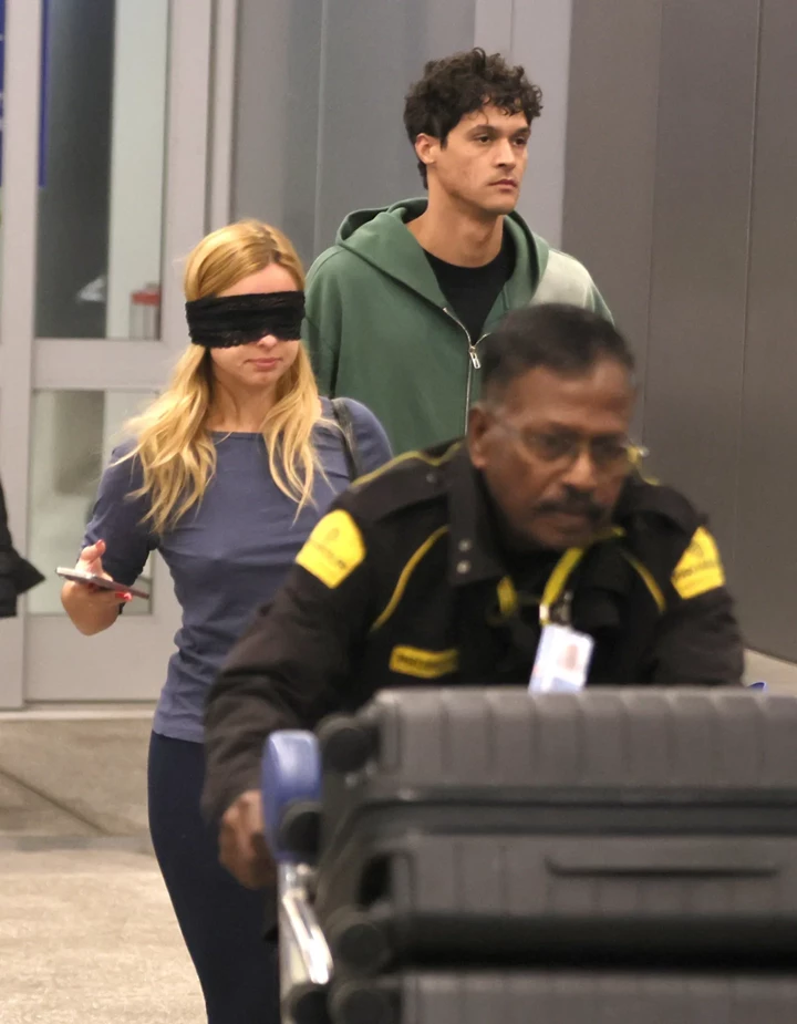 Addison Rae Spotted Wearing a Blindfold at LAX Airport in Los Angeles 11-19-2025